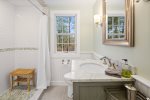 Upper level full bathroom with walk-in shower
